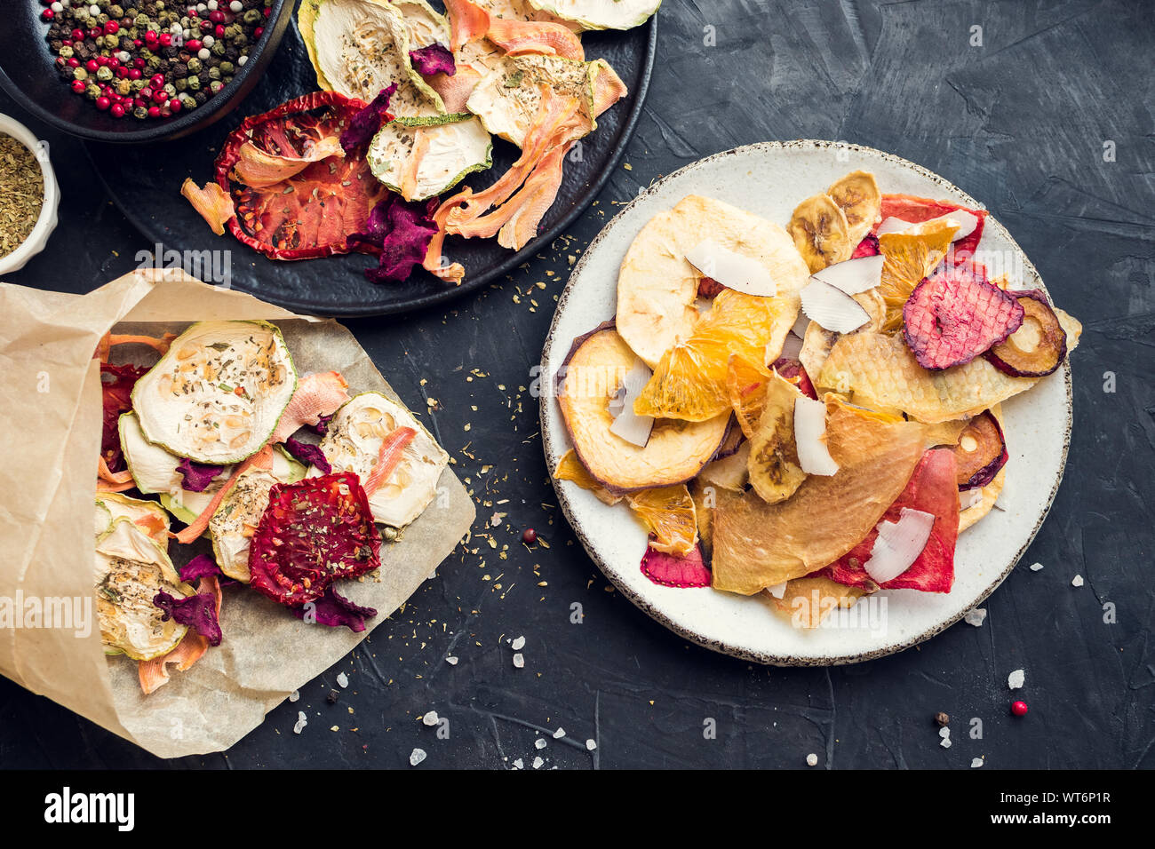 Healthy homemade fruit and vegetable chips on dark background. Organic diet  food. The vegan diet. Dried vegetables. Vegetarian plant based snack conce  Stock Photo - Alamy, image size:1300x956