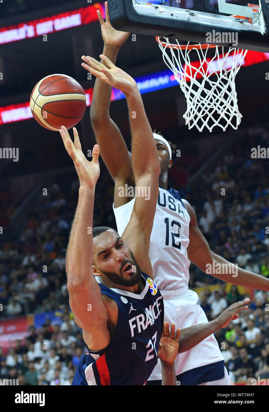 Dongguan, China's Guangdong Province. 11th Sep, 2019. Myles Turne (R) of the United States vies with Rudy Gobert of France during the quarter-final match between the United States and France at the 2019 FIBA World Cup in Dongguan, south China's Guangdong Province, Sept. 11, 2019. Credit: Zhu Zheng/Xinhua/Alamy Live News Stock Photo