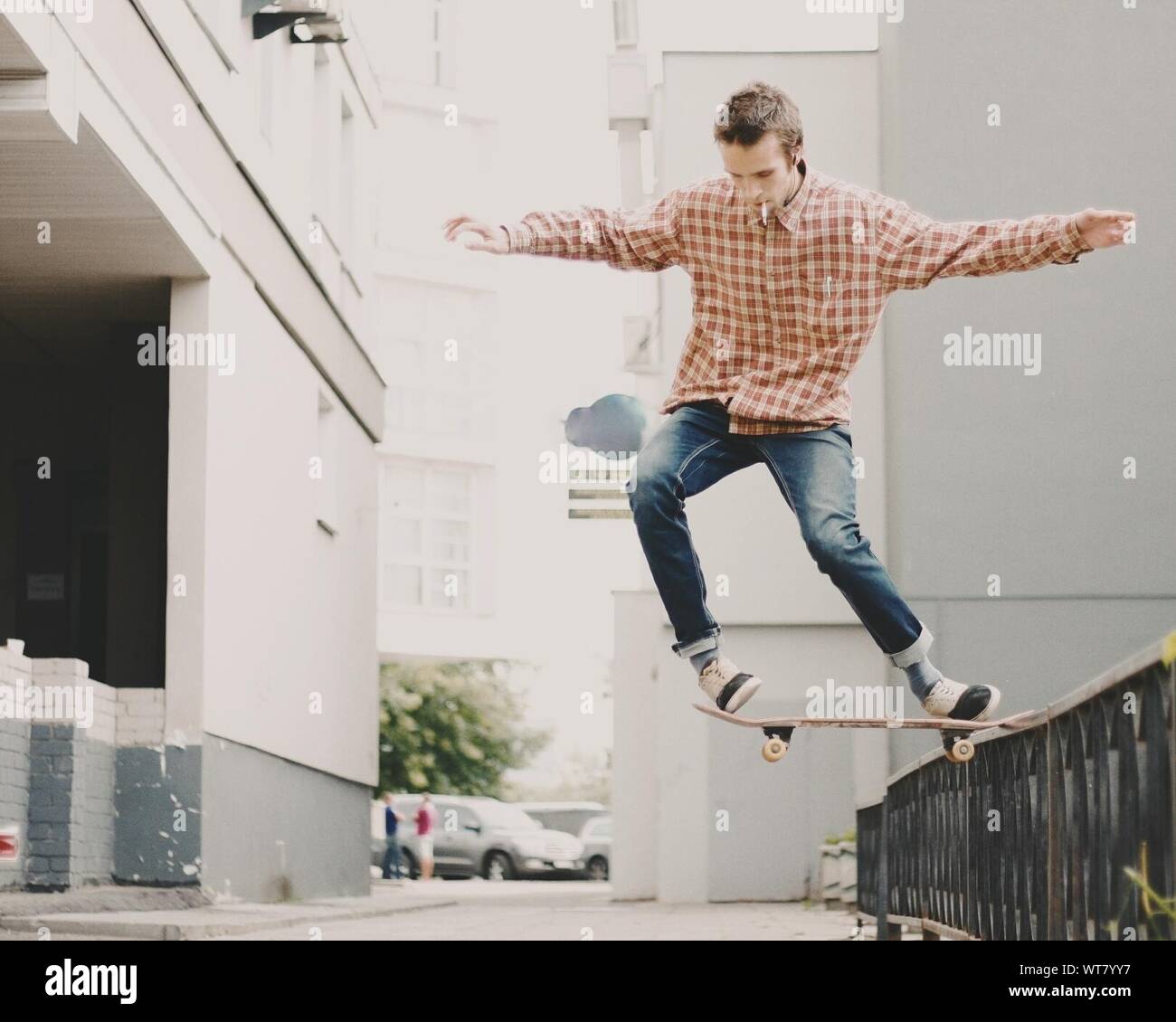 Full Length View Of Man Skateboarding Stock Photo