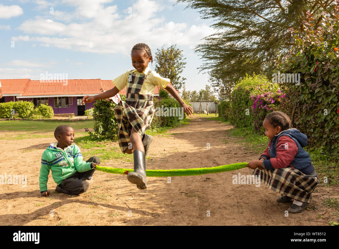 Children jumping rope africa hires stock photography and images Alamy