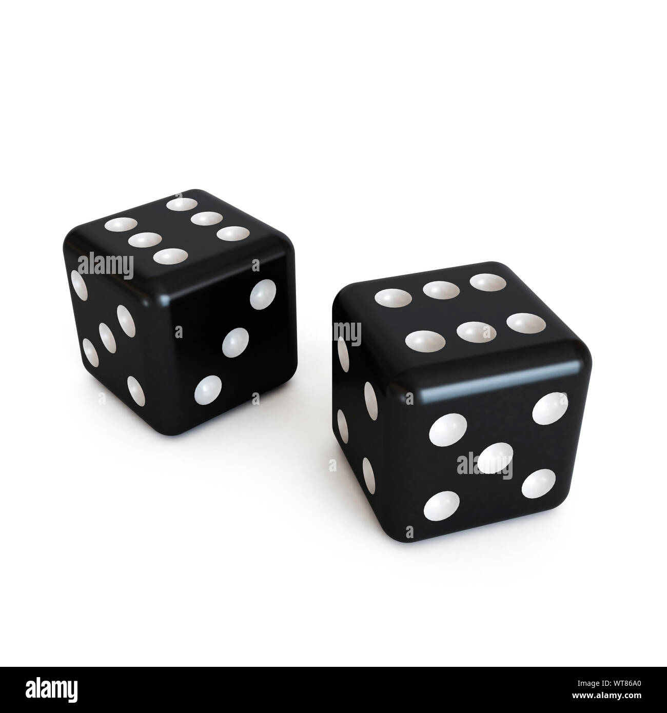 Pair of black dice, both showing six or a pair of sixes Stock Photo