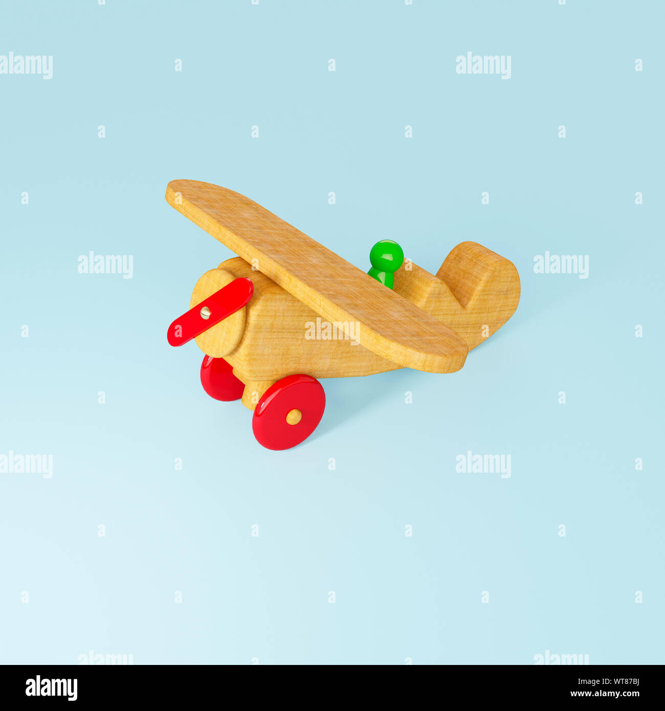 Childrens wooden toys, a wooden aeroplane and pilot toy Stock Photo