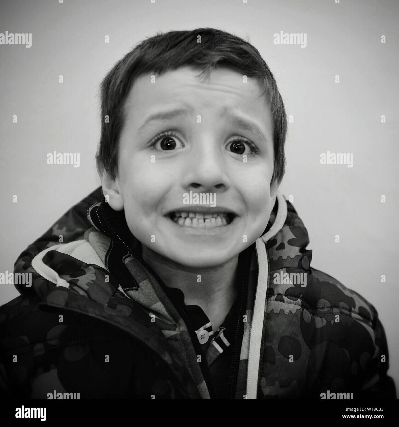 Portrait Of Grinning Boy Stock Photo