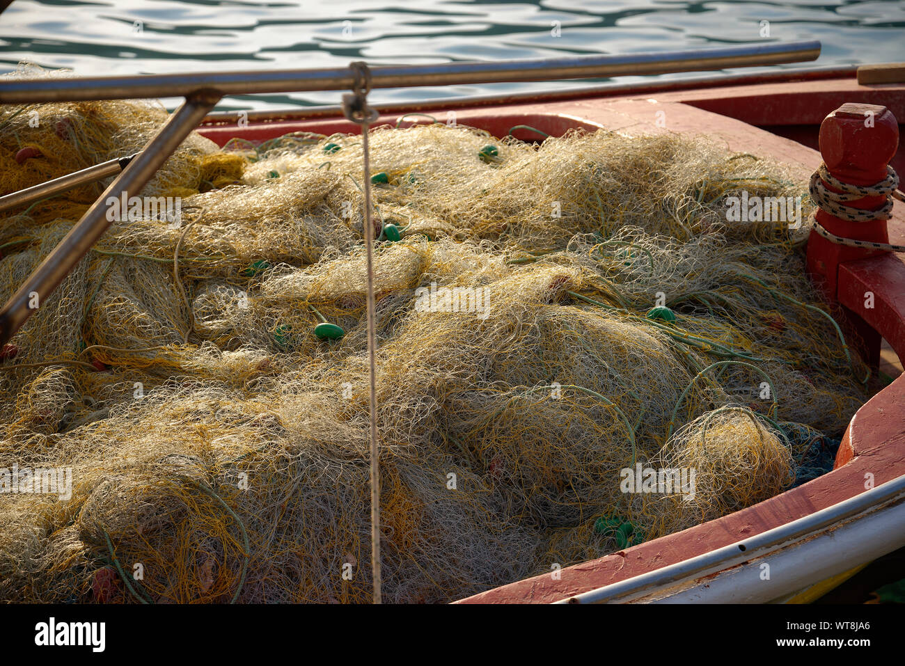 Fishing nets in a small fishing boat Stock Photo - Alamy