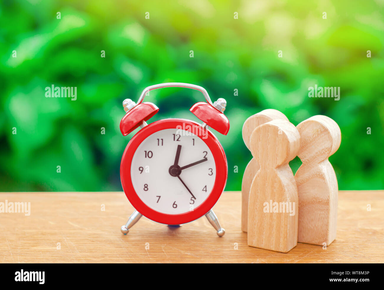 Clock with human figures hi-res stock photography and images - Alamy