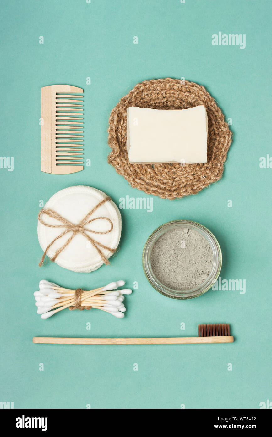 Set of eco-friendly plastic-free body care items on the mint background ...