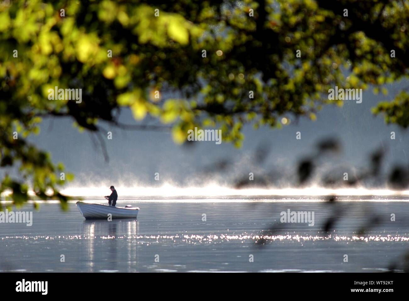 Single Man Boating One man fishing boat hi-res stock photography and images - Alamy