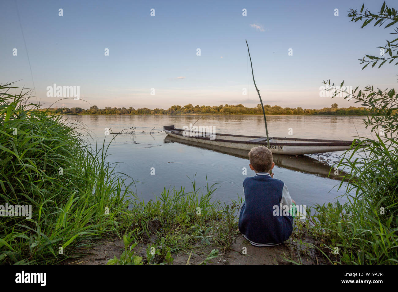 Boy river boat hi-res stock photography and images - Alamy