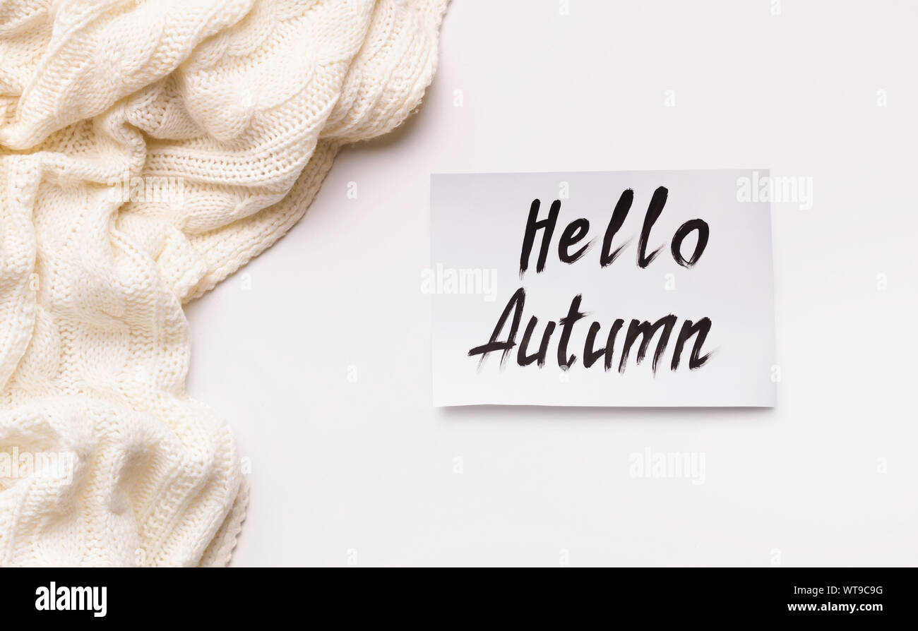 White wool scarf with creative text on white background Stock Photo