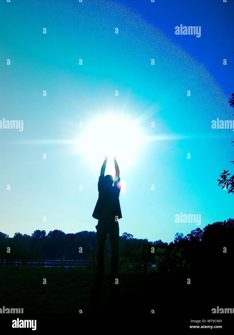 Raising arms to the sky hi-res stock photography and images - Alamy