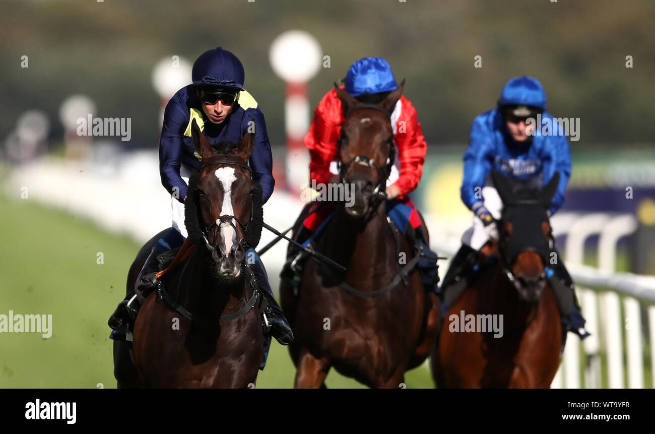 Maybe Today ridden by William Buick (left) wins the British EBF Premier Fillies' Handicap during day one of the William Hill St Leger Festival at Doncaster Racecourse. Stock Photo