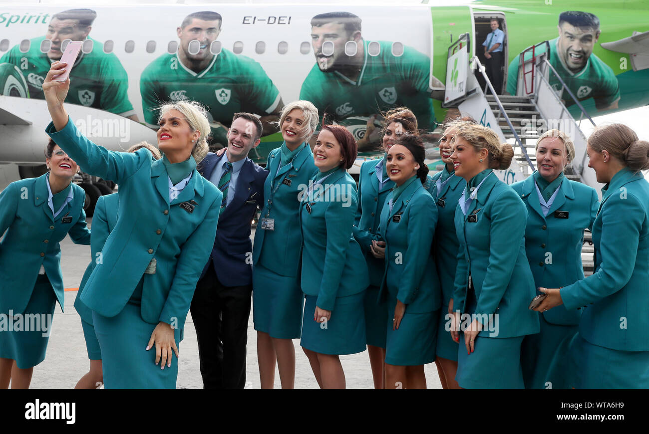 Aer Lingus cabin crew take a selfie with the plane at Dublin Airport after  the Ireland team boarded to depart for the 2019 Rugby World Cup in Japan  Stock Photo - Alamy