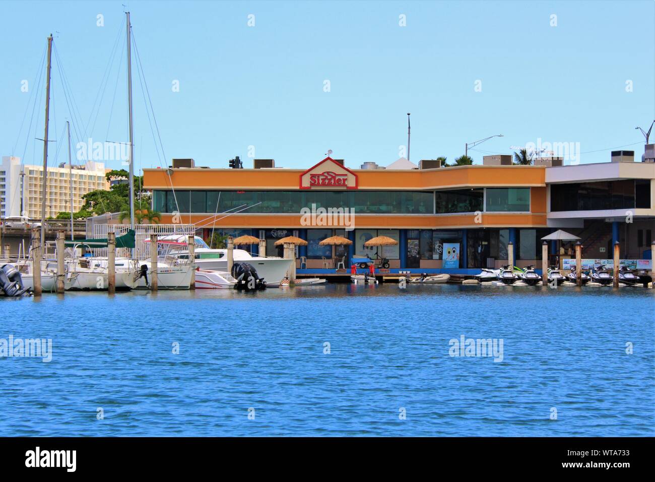 The 'Sizzler' U.S restaurant chain in the San Juan Bay Marina, Puerto Rico. Stock Photo