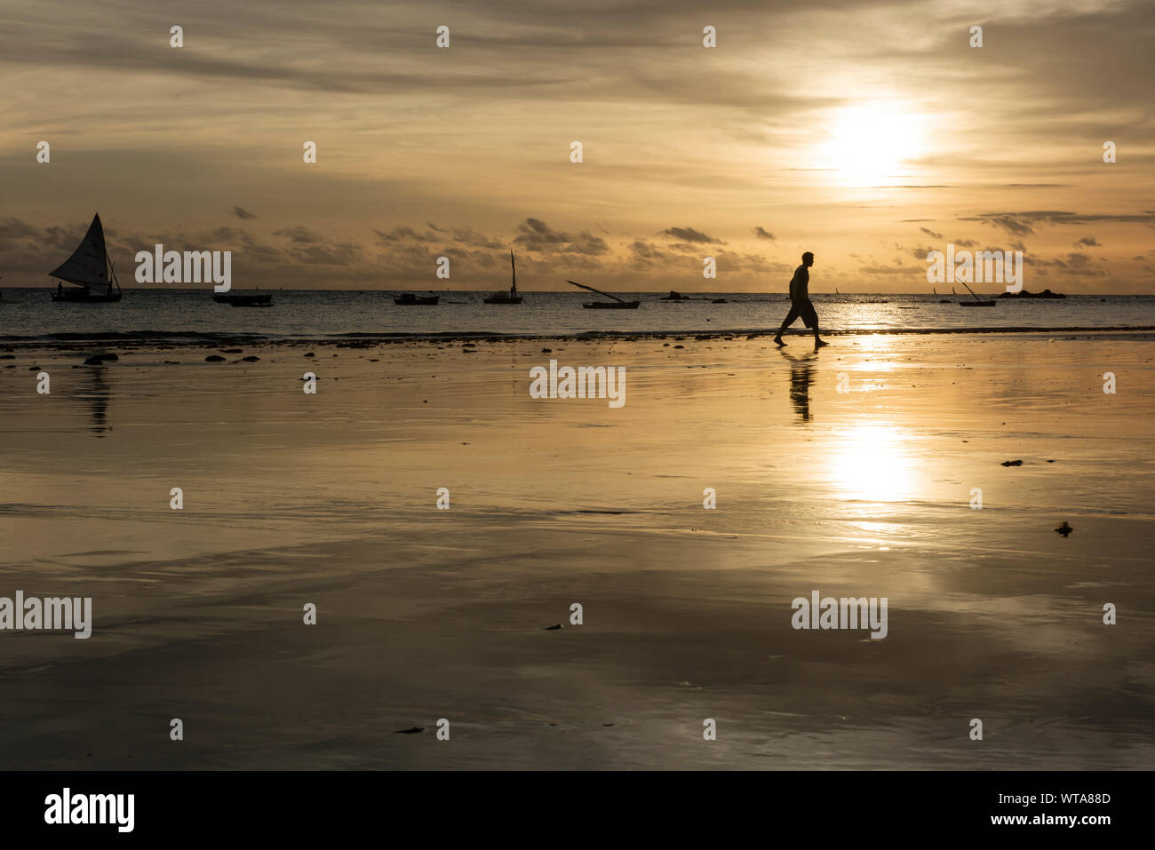 Man walking in the sea shore of Redonda beach Stock Photo