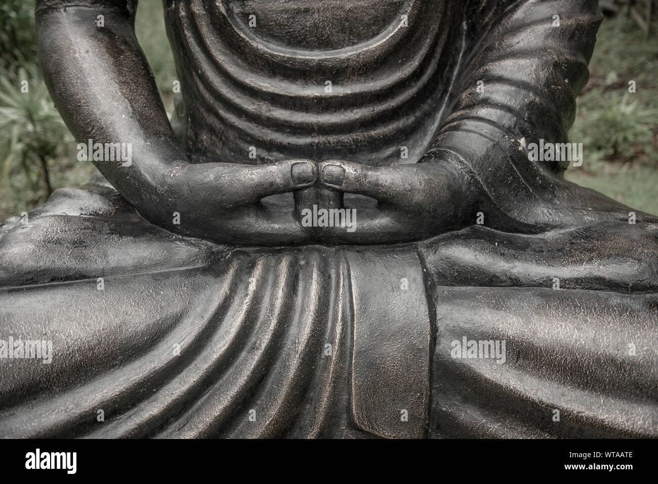 Buddha statue in a garden Stock Photo - Alamy