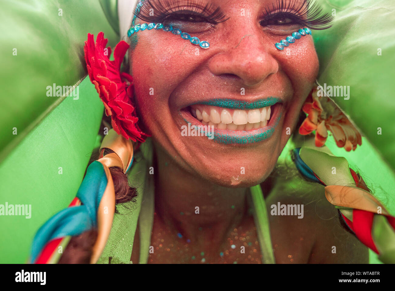 Beautiful woman in costume enjoying Rio de Janeiro carnival Stock Photo ...