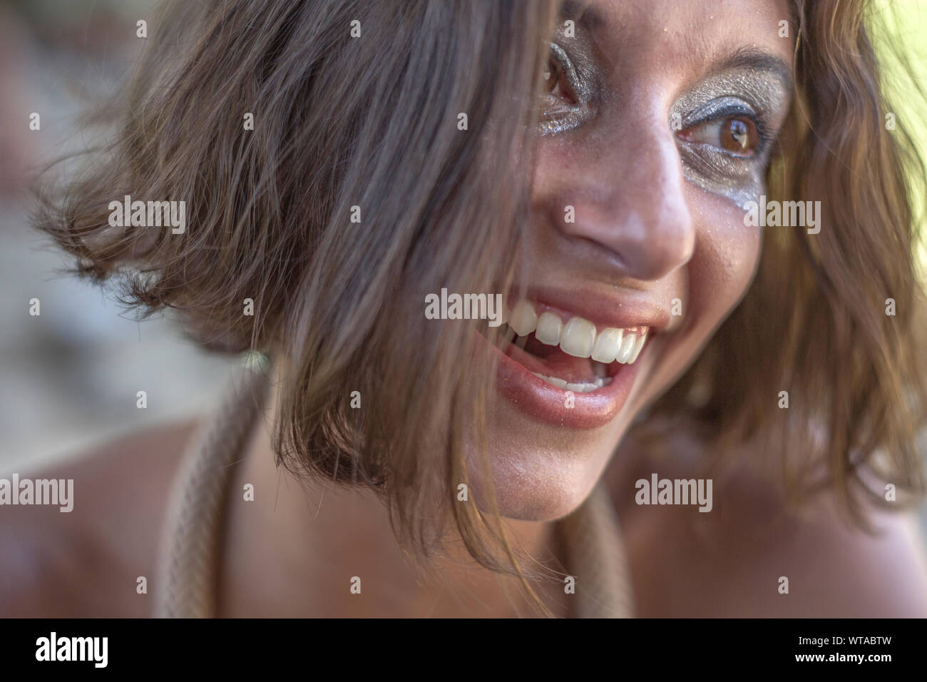 Beautiful and smiling young woman in Rio carnival Stock Photo
