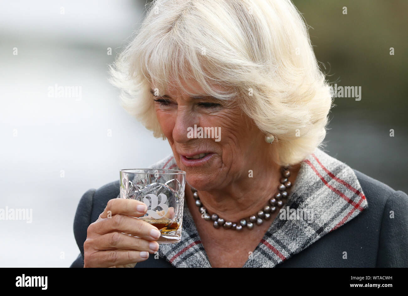 The Duchess of Rothesay has a whisky during a visit to Bladnoch Distillery where the Duke and Duchess officially opened a new visitor centre at the Bladnoch Distillery at Bladnoch Distillery, the southernmost distillery in Scotland dating back to 1817, in Bladnoch, Galloway, Scotland. PA Photo. Picture date: Wednesday September 11, 2019. See PA story ROYAL Charles. Photo credit should read: Andrew Milligan/PA Wire Stock Photo
