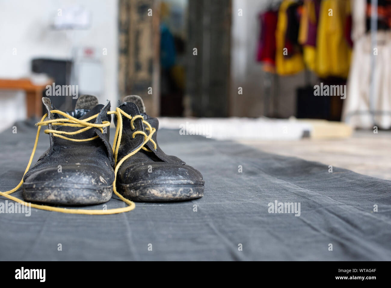 Boots of a personage in a theater dressing room Stock Photo