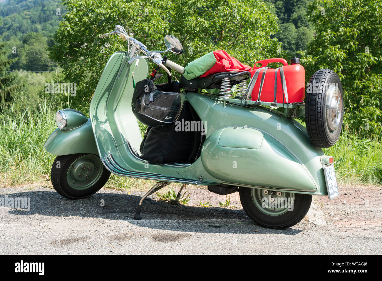 Classic motorbike, a vintage Italian Vespa Piaggio during a meeting for historic vehicles Stock Photo