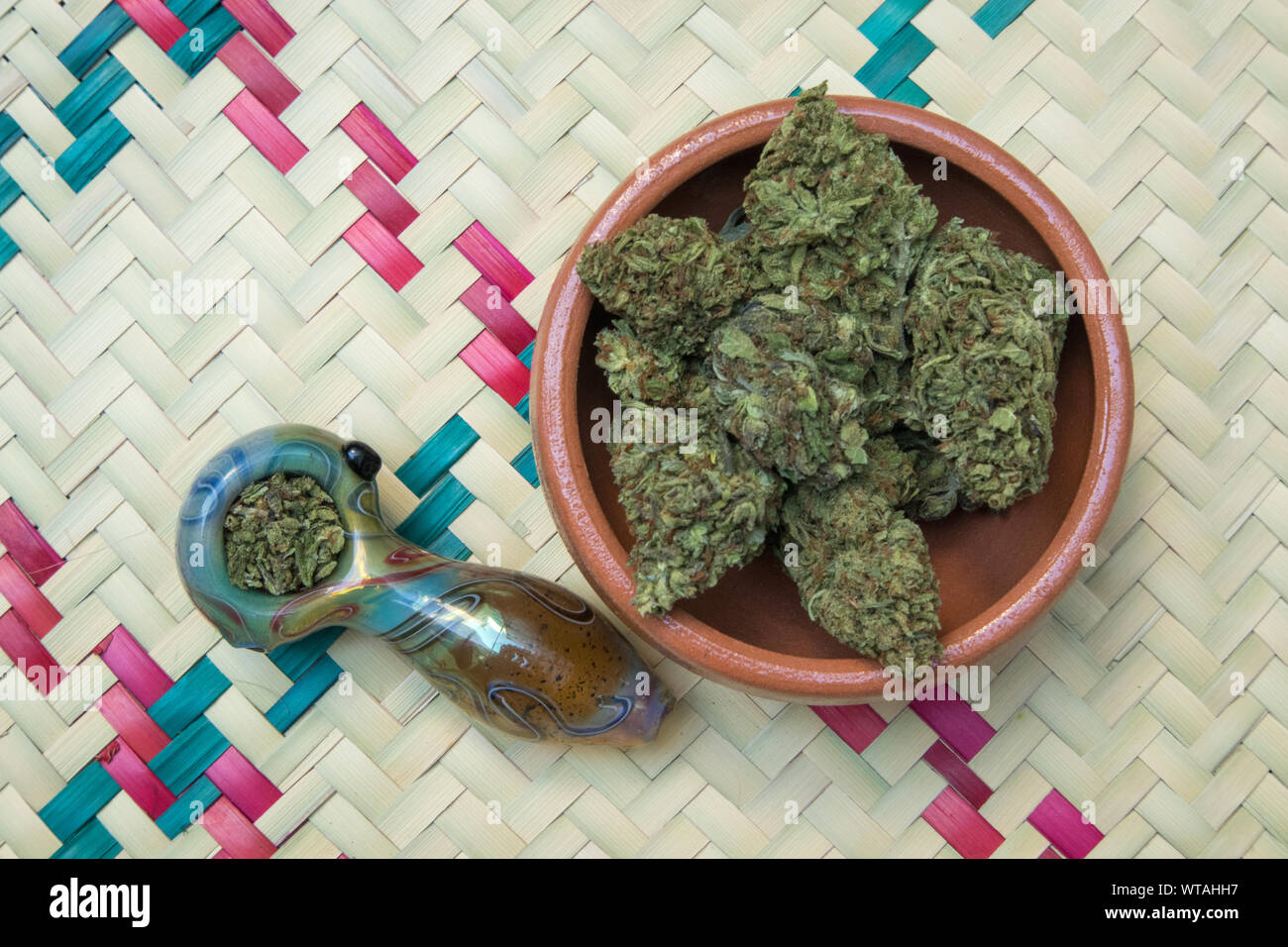 Smoking Pipe And Cannabis Leaves. Smoking Mix Of Marijuana, Medicine And  Recreational Drug. Stock Photo, Picture and Royalty Free Image. Image  124438073.