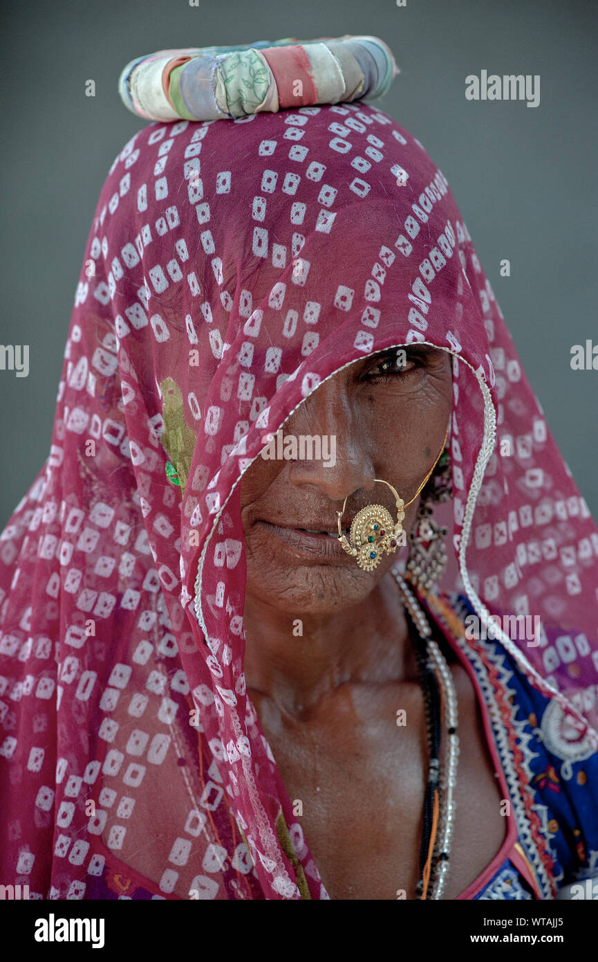 Rajasthani woman with traditional clothes and nose ring Stock Photo