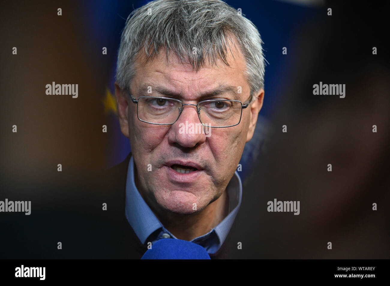 Brussels, Belgium. 11th Sep, 2019. Maurizio Landini, secretary-general of the Italian General Labor Confederation (CGIL), answers questions from press during his visit to the EU headquarters in Brussels, Belgium, Sept. 11, 2019. Credit: Riccardo Pareggiani/Xinhua Stock Photo