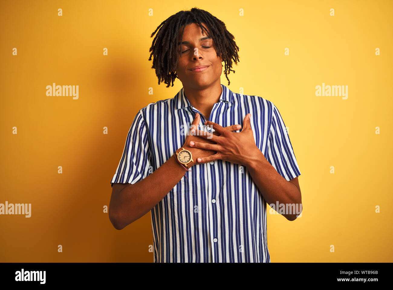 Dreadlocks Chest Afro man with dreadlocks wearing casual striped t-shirt over isolated ...