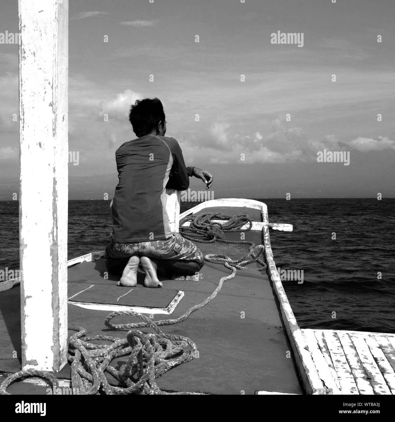 Man Kneeling, Rear High Resolution Stock Photography and Images - Alamy
