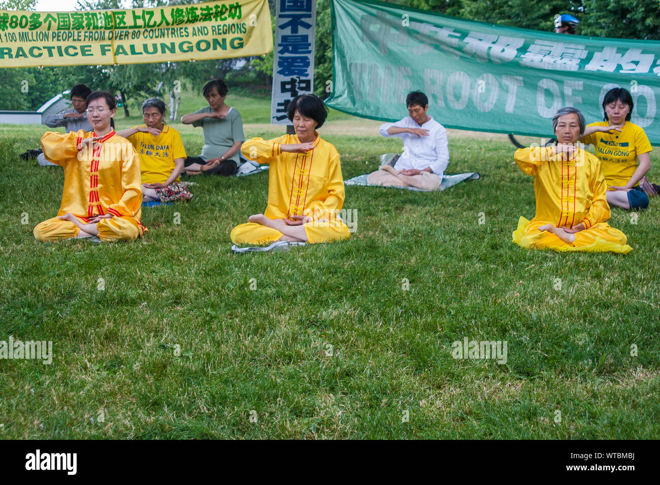 Toronto, Canada - Chinese followers of Falungong practicing meditation and exercises at a public park of Toronto Stock Photo