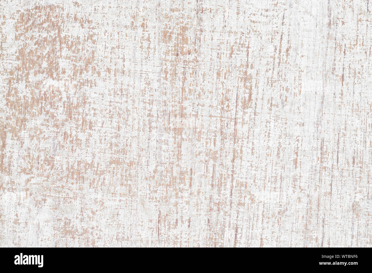 Grunge background. Peeling white paint on an old wooden background. rusty weathered wood planks. Stock Photo