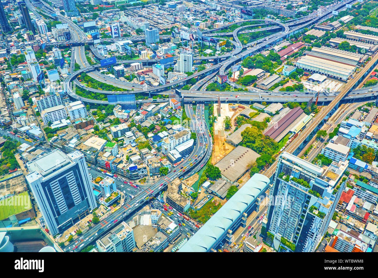 BANGKOK, THAILAND - APRIL 24, 2019: The large highway intersection with multi height roads in the heart of modern city connects various remote distric Stock Photo
