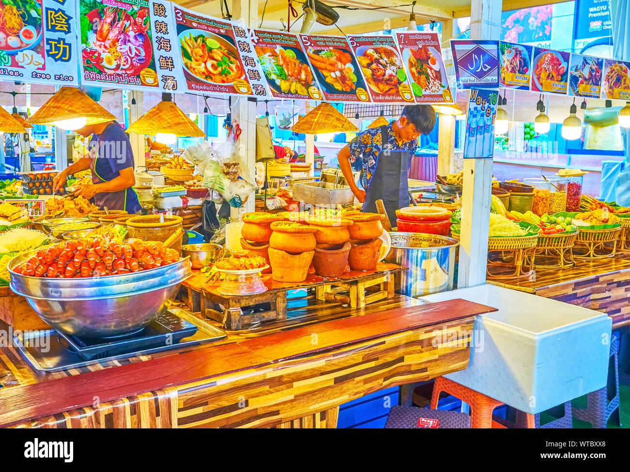 BANGKOK, THAILAND - APRIL 24, 2019: The young cook waits for the