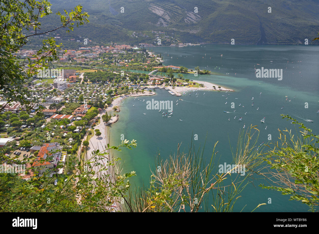 alps, architecture, beautiful, blue, boats, destination, edge, europe, harbor, italy, lago di garda, lake, landscape, malcesine, mountain, mountains, Stock Photo