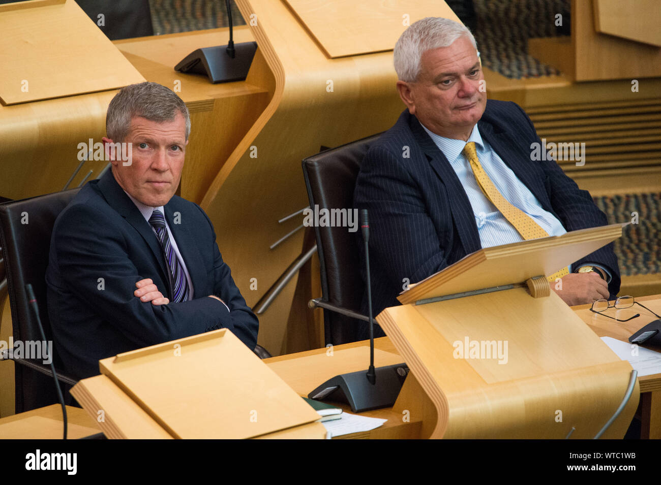 Edinburgh, UK. 5 September 2019. Pictured: (L-R) Willie Rennie MSP - Leader of the Scottish Liberal Democrat Party; Mike Rumbles MSP for North East Scotland. Scottish Government Debate: Avoiding A No Deal Exit From The EU.  That the Parliament agrees that the UK should in no circumstances leave the EU on a no-deal basis, and condemns the Prime Minister’s suspension of the UK Parliament from as early as 9 September until 14 October 2019. The result of the division is: For 87, Against 28, Abstentions 0. Colin Fisher/CDFIMAGES.COM Stock Photo