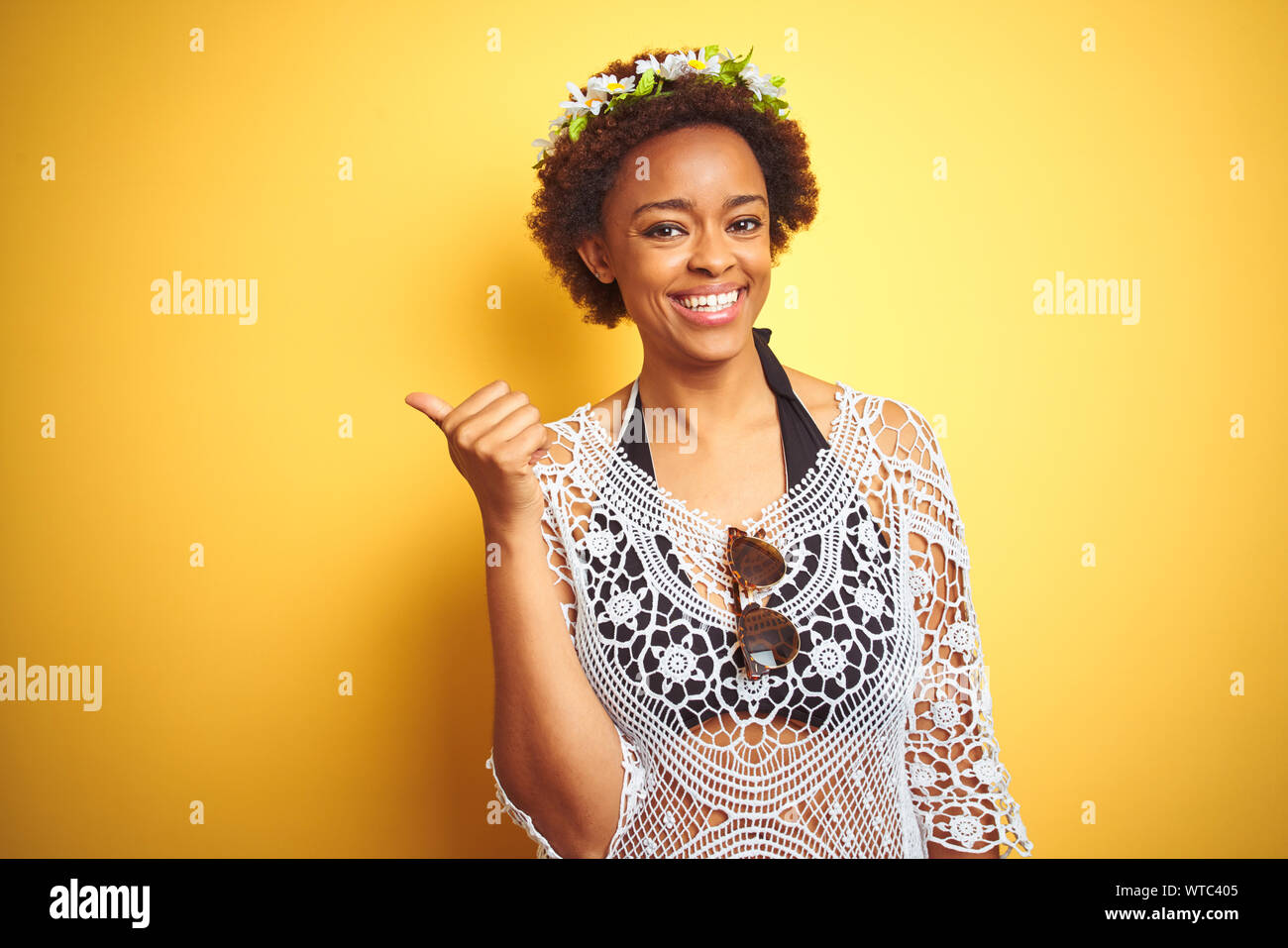 Young African American Woman With Afro Hair Wearing Flowers Crown