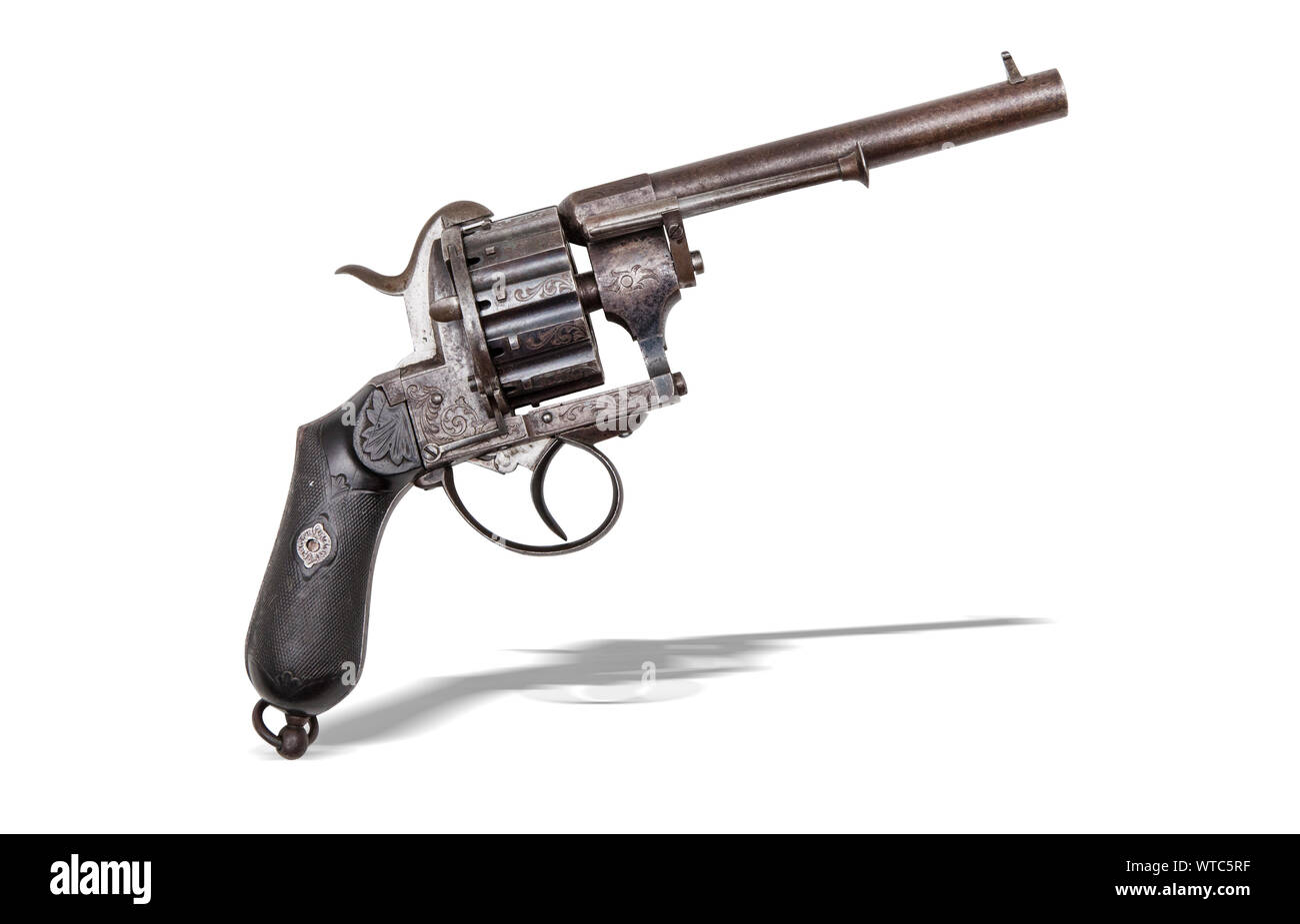 French J. Chaineux 12 shot pinfire revolver, CA. 1860, barrel: 6”, 36 cal., double action revolver, with fine engraving on the octagon barrel section. Stock Photo