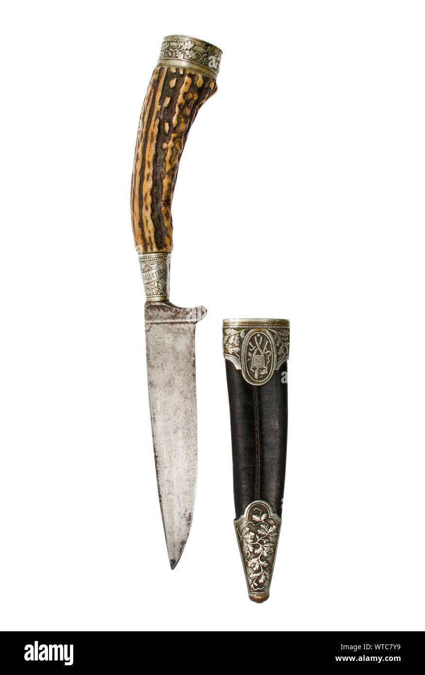 Presentation grade bavarian hunting skinning knife with solingen blade with the stag horn handle mounted in silver with a slogan in German: God protec Stock Photo