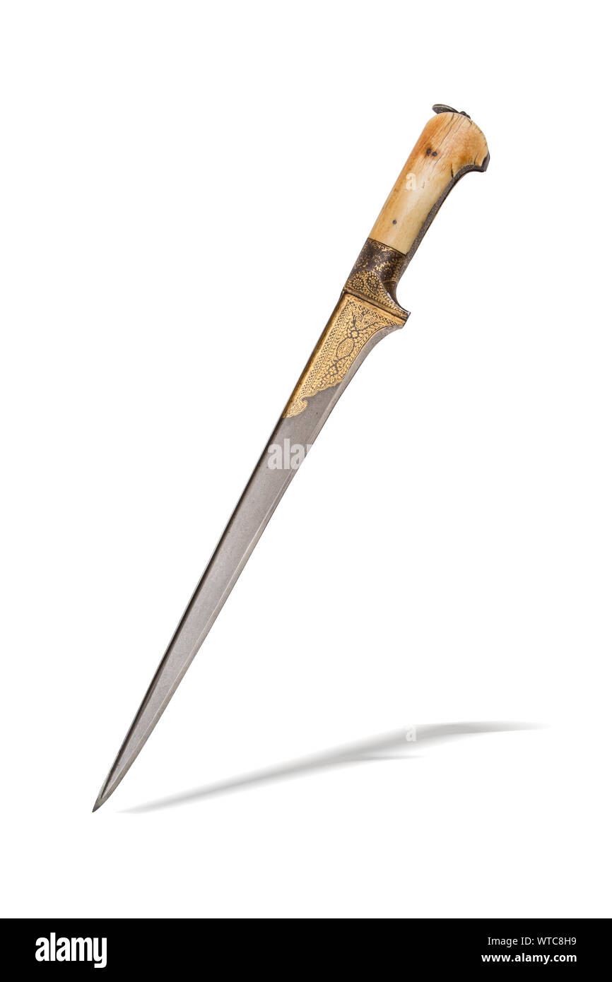 Central Asian khyber knife of the 19th century with iron hilt decorated with gold koftgari, bone grip scales, T-shaped blade of Wootz steel with koftg Stock Photo