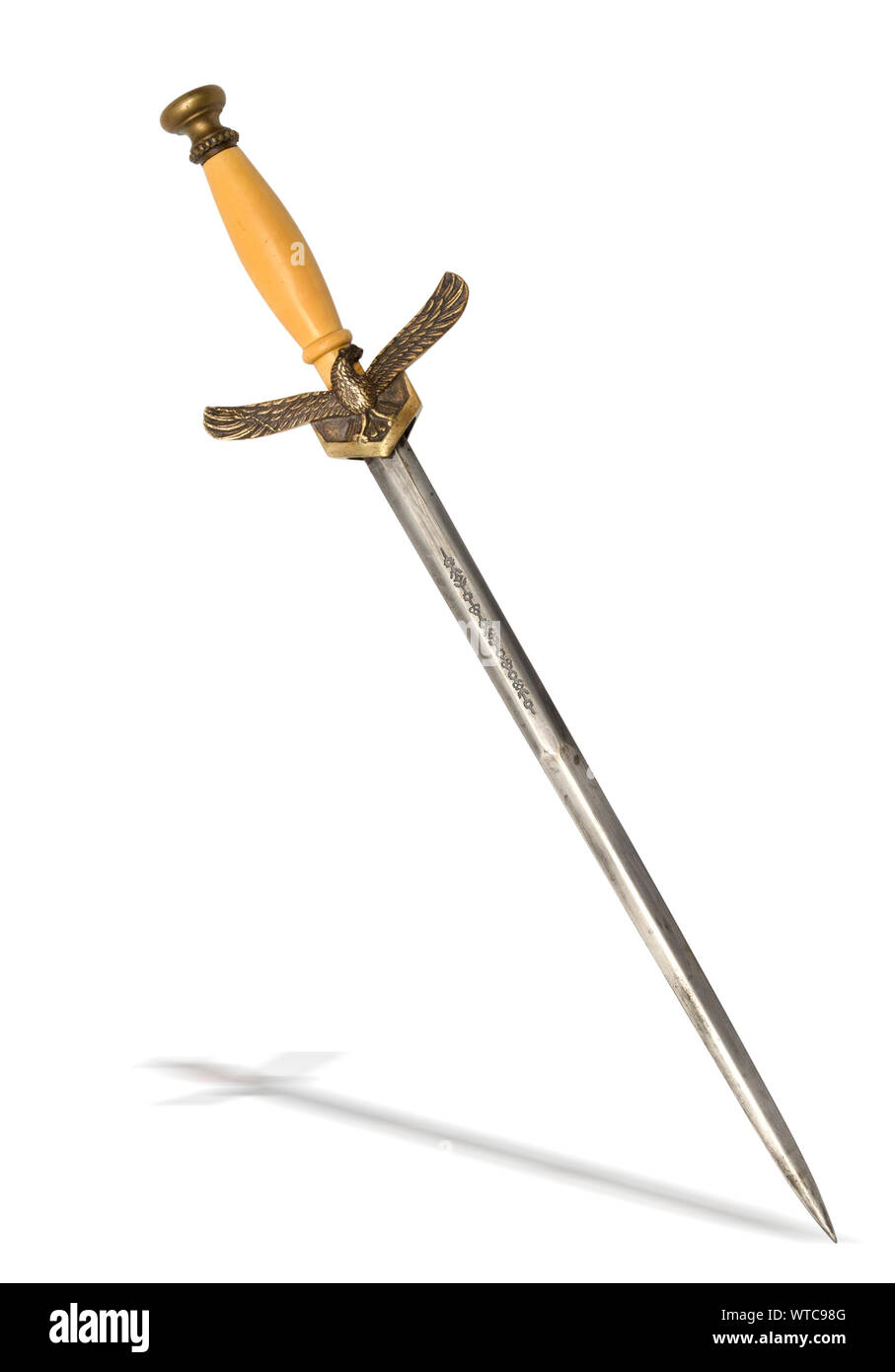 A South African M1965 Air Force Non-Commissioned Officer’s Dress Dagger, unmarked blade with ornate floral etchings on both sides, brass crossguard wi Stock Photo