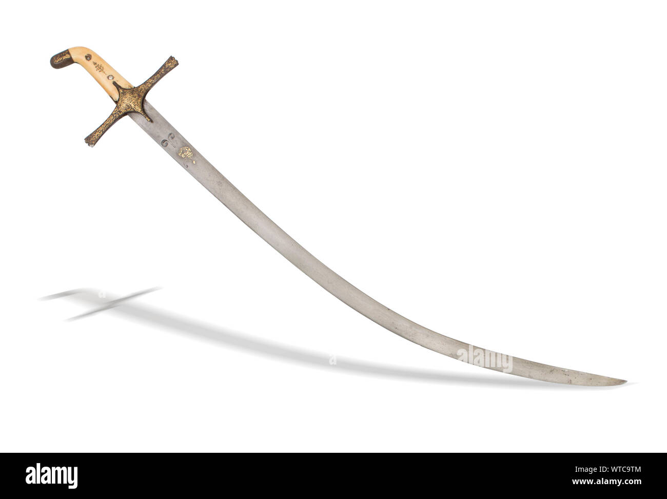 Turkish Ottoman shamshir sword of the 19th century. A shamshir is a type of Middle Eastern sword with a radical curve. Stock Photo