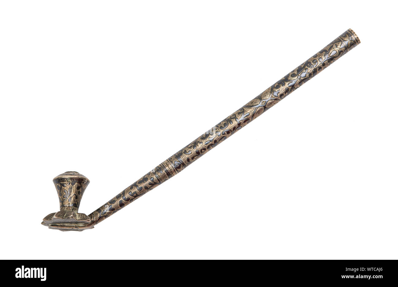 Caucasian smoking pipe of the 19th century made of solid silver decorated with niello work. Stock Photo