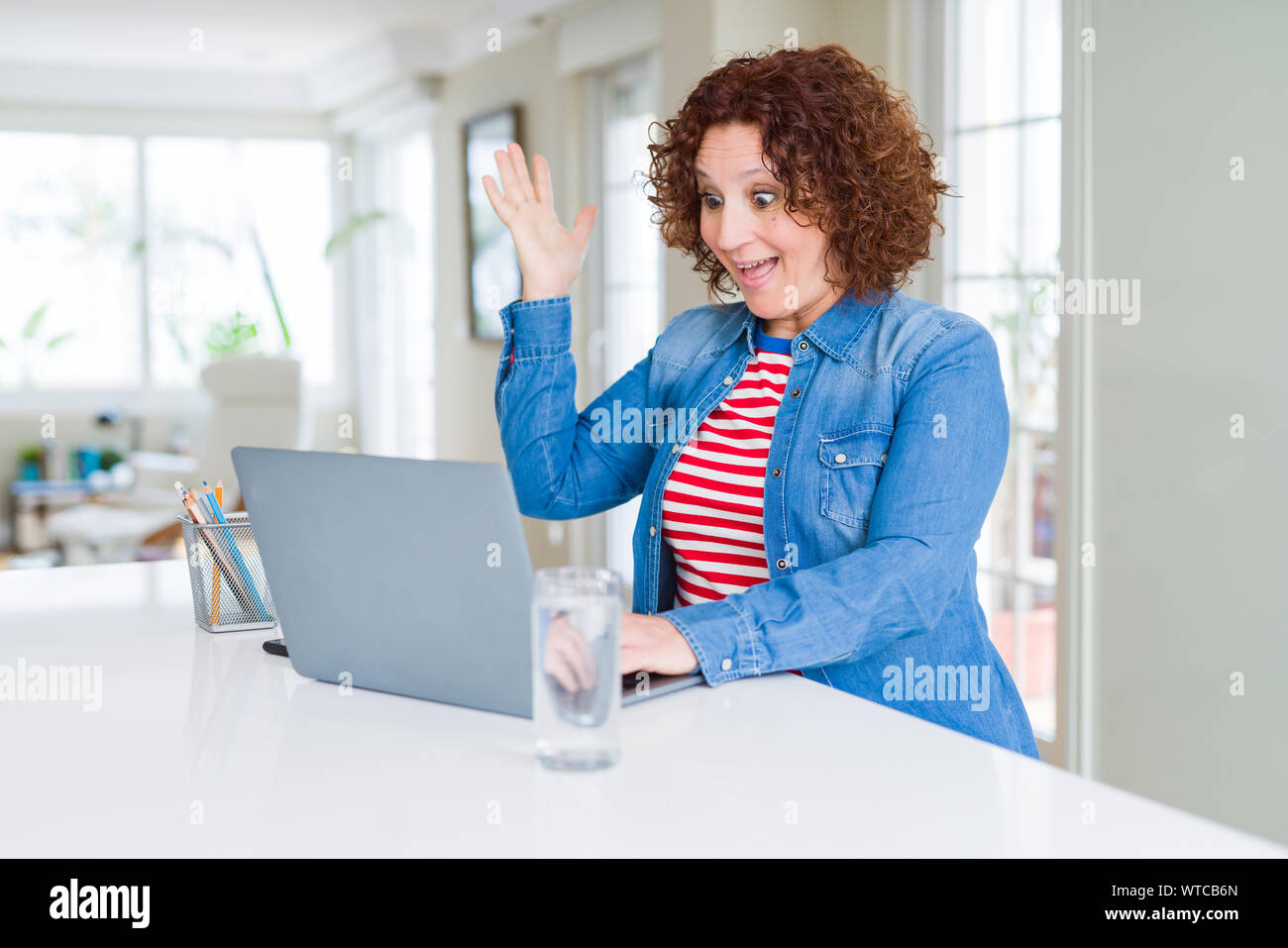Senior woman working using computer laptop very happy and excited ...