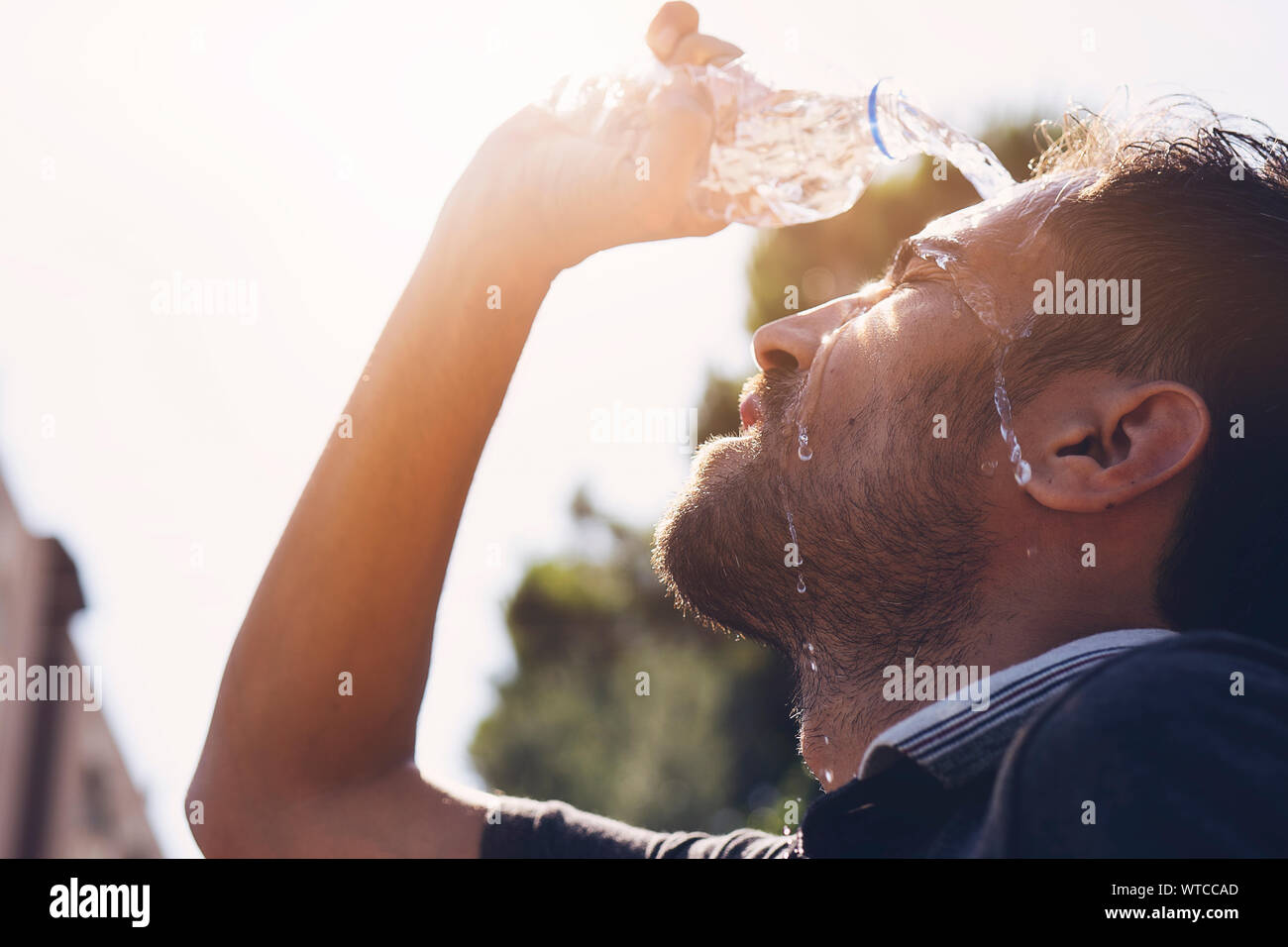Pouring water on head hires stock photography and images Alamy