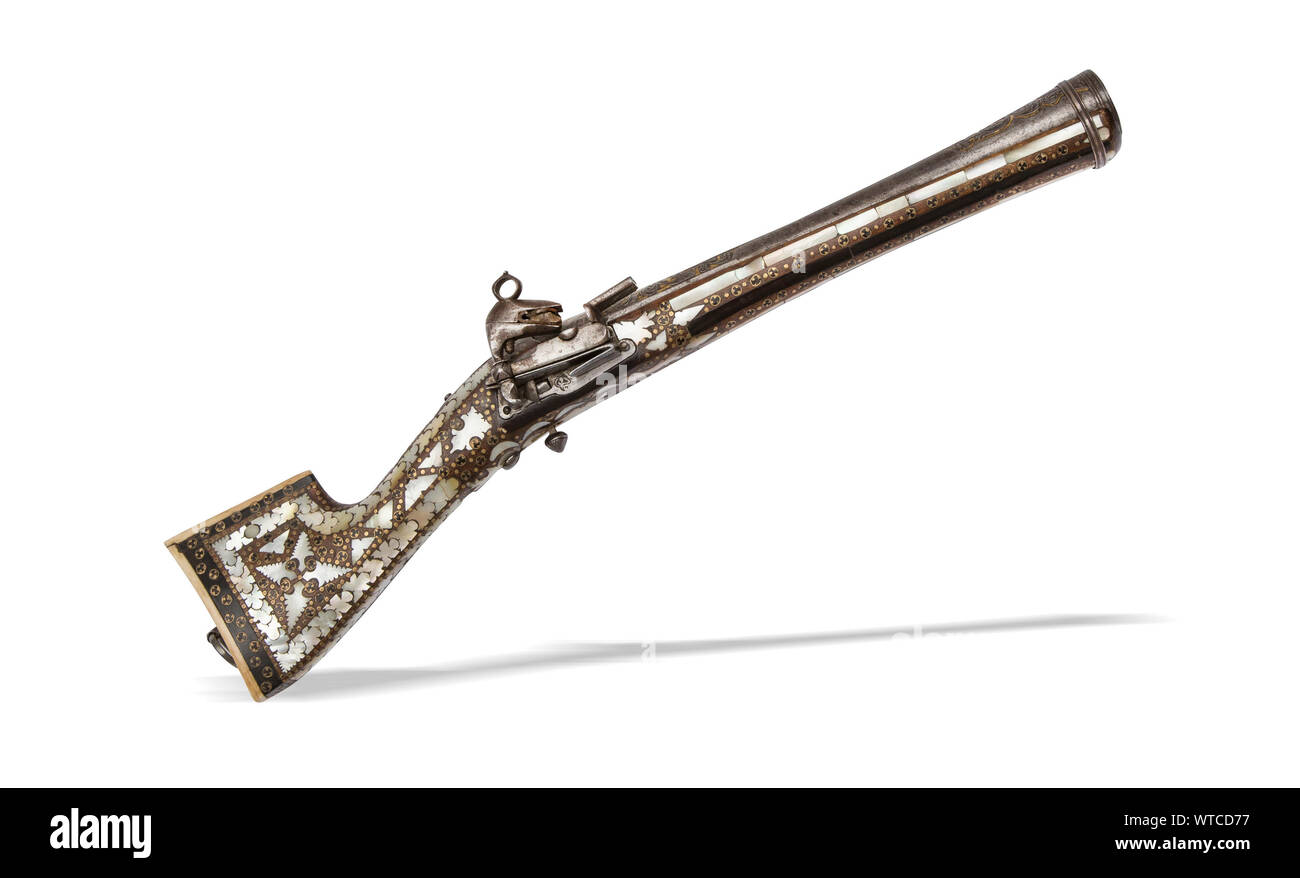 Georgian (Caucasian) blunderbuss pistol ot the middle 19th century. with fine barrel made from chiseled steel decorated with fire gilt. Stock Photo