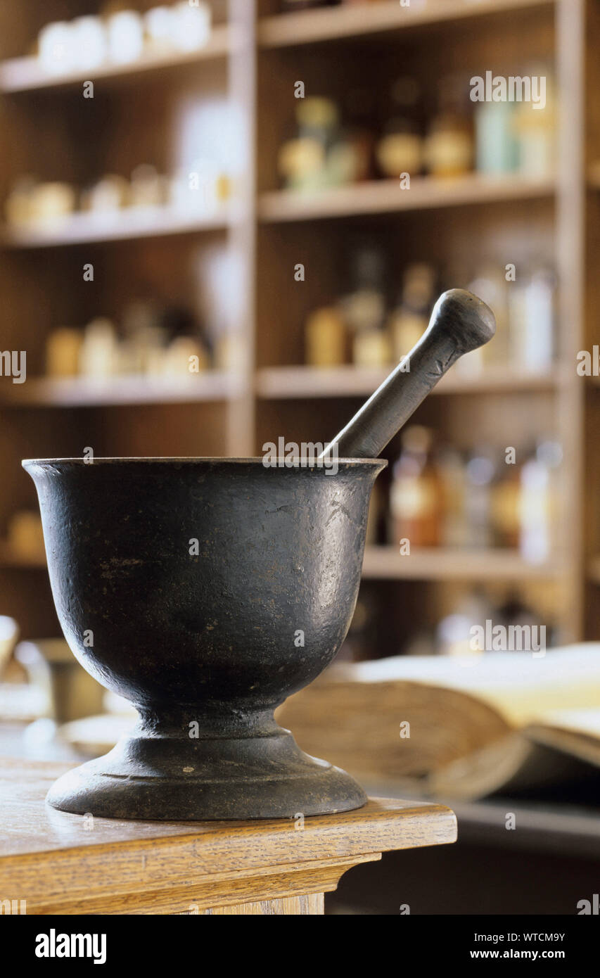 Mortar and Pestle in a Vintage Pharmacy Stock Photo