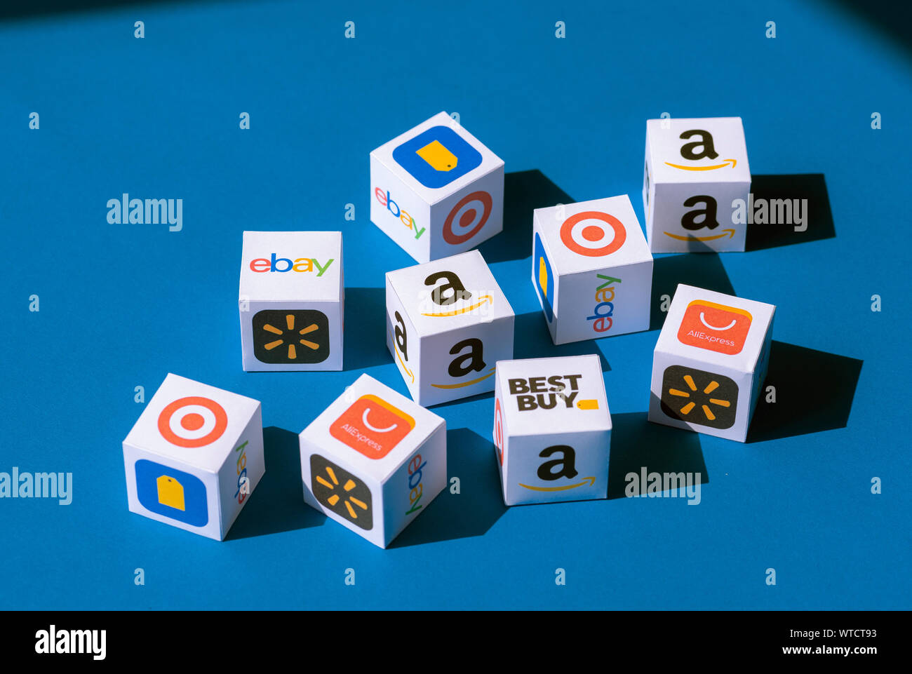 Kyiv, Ukraine - September 10, 2019: A paper cubes collection with printed logos of eCommerce corporations and online retail stores. Stock Photo
