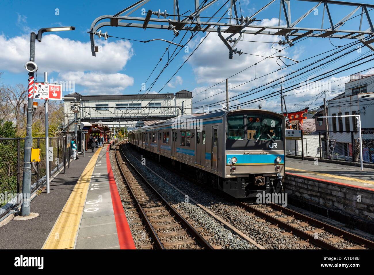 JR, Japan Rail Train to Inari Rail Station, Kyoto, Japan Stock Photo