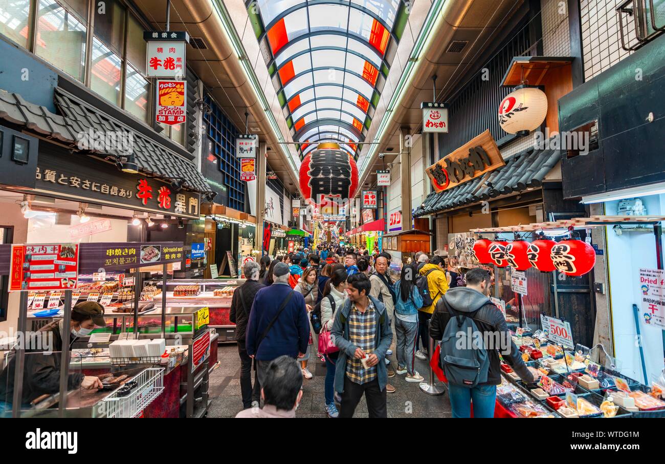 Visitors at Kuromon Ichiba Market, Osaka, Japan Stock Photo