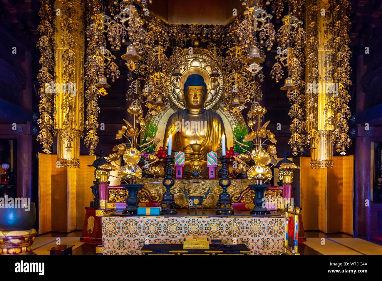 Golden Buddha Statue in Chion-in Temple, Kyoto, Japan Stock Photo